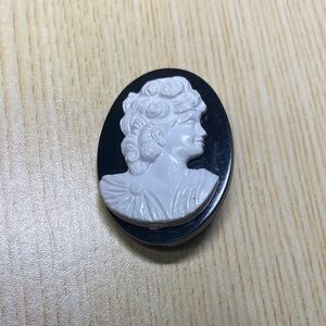 Elegant Black and White Cameo Brooch
